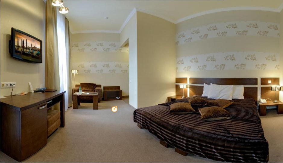 Four Rooms Mini-Hotel Charkov Pokoj fotografie